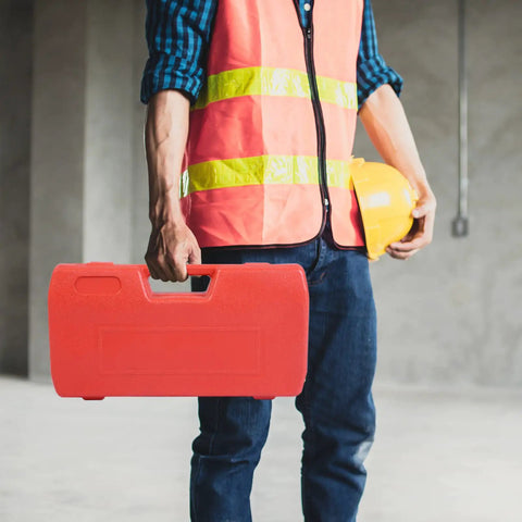 Worker holding a red storage case for Ratcheting Pipe Threader Kit With Six Dies For One Quarter, Three Eighths, One Half, Three Quarters, One, And One And Quarter Inch Pipes, Heavy Duty Threading Tool Set With Durable Storage Case