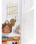 Slick Wall Mount Coat Rack With Sturdy Round Metal Hooks To Hang Your Daily Gear In The Entryway Or Bedroom Closet Without Scratching Jackets No Hassle, showcasing brown bag and hats.