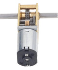 Heavy Hitter Brushed DC Gear Motor Churning Out Steady 34RPM Torque Via Dual Shafts And All Steel Gears Built Rock Solid For Robot Projects And Home Fixes showing internal gears and dual shafts.