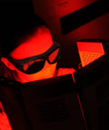 Pro Grade Ipl Laser Safety Glasses For At Home Hair Removal And Salon Work Broad Spectrum OD 5 eye shields worn in red light setting.