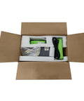 Compact Air Pillow Maker Machine unboxed with components including user manual and plastic roll, ready for use.