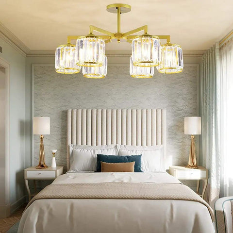 Modern Ceiling Pendant Light Featuring Transparent Crystal And Polished Gold Cylinder Frame For Living Room Bedroom Hotel Lobby energy saving fixtures above a stylish bed.