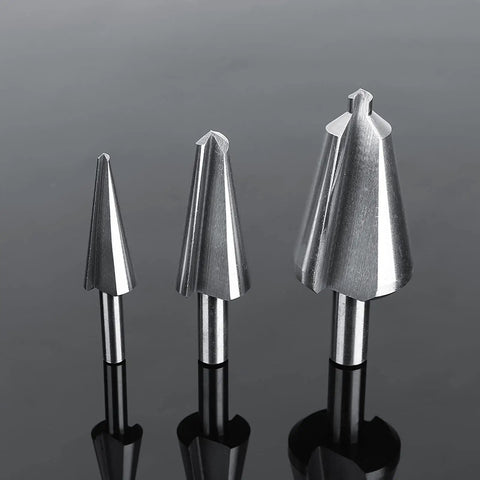 Built Tough Three Piece High Speed Steel Tapered Umbrella Step Drill Bit Set With No Nonsense Self Starting Tip and Smooth Chamfer Cutting for Metal Wood Plastic and Shop Floor Tasks at various angles.
