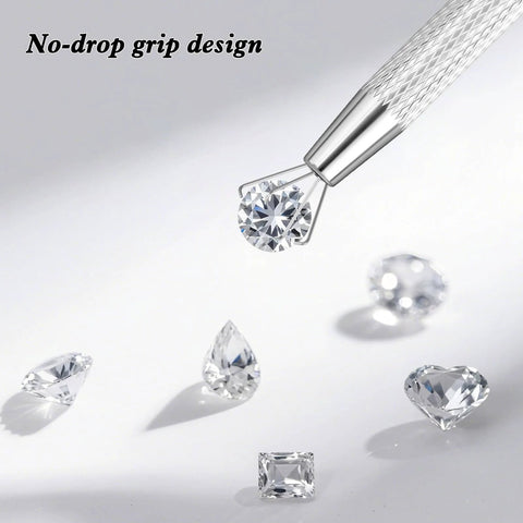 Close-up of Piercing Ball Grabber Tool Kit For Jewelry Changes Must Have Internal And External Threaded Inserts holding a gemstone.