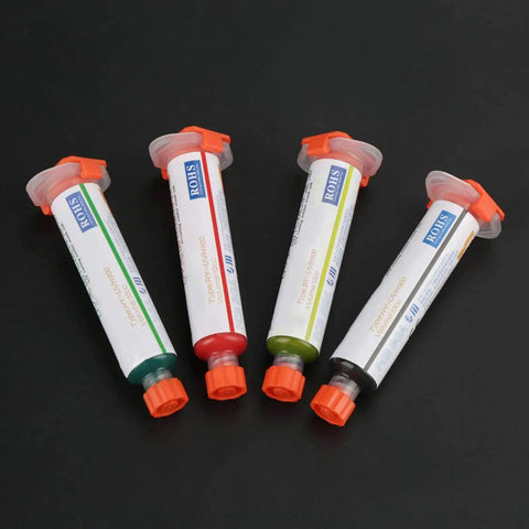 Pro Level Solder Flux Paste Kit For DIY PCB Repair And BGA Welding with four colorful paste syringes on black background