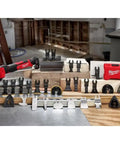 Professional Grade Oscillating Multi Tool Blades One Three Eighths Inches Carbide Tipped Cutting Edges Five Pack Heavy Duty Power Tool Accessories displayed on a workbench.