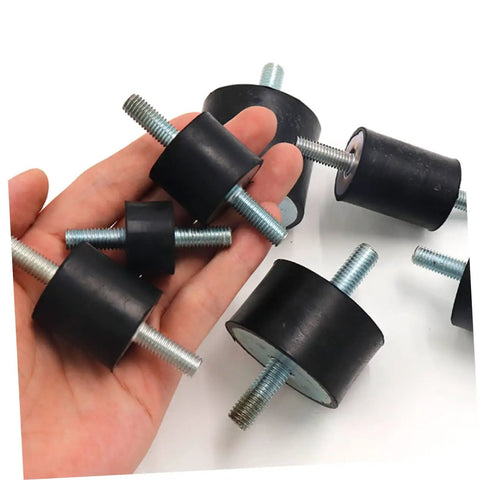 Heavy Duty Round Rubber Vibration Damping Mounts Four Pack in hand, showcasing black rubber pads with steel bolts.