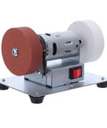Sick Smooth Mini Bench Grinder Stainless Steel Electric Desktop Belt Sander With No Sweat Knife Sharpening And Fast Blade Restoration Slick Plug Play Garage Essential showing red and white sanding wheels with metal base.