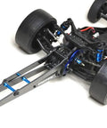 Close-up of Dr10 Wheelie Bar Set 12 Inch Carbon Fiber and Alloy Adjustable for RC Cars and Trucks ETK1962, attached to RC car chassis.