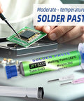 Sn63 Pb37 Tin Solder Paste For Electronics Soldering Flux 183 C Melting Point, syringe and tips next to PCB repair scene