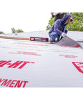 Cut Through Frost And Slush Fast With This High Temp Resistant Synthetic Ice And Snow Barrier Plus Heavy Duty Outdoor Ground Shield And Quick Roll Weather Protection Mats For Driveways being installed on a roof.