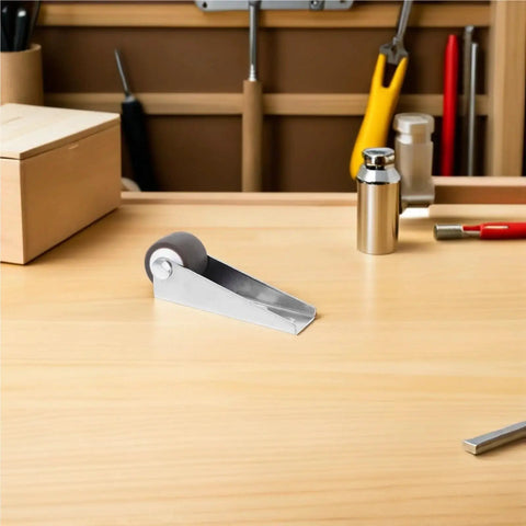 Four Piece Heavy Duty Sliding Door Rollers With Premium Rubber Caster Wheels For Wardrobe And Barn Cabinet Tracks shown on workbench.