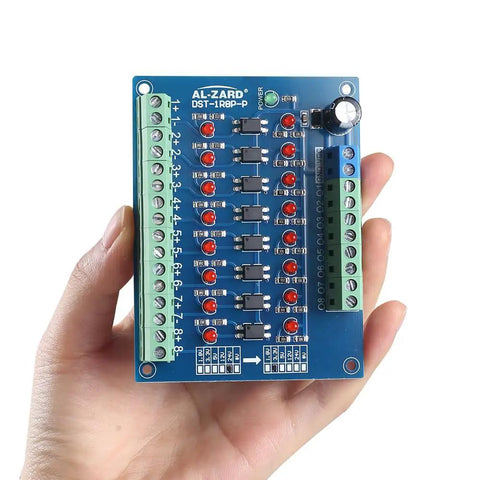 Hand holding an 8 Channel Optocoupler Isolation Board No Fuss 24V To 3.3V Level Shifter For PLC and MCU Signals PNP Output Photoelectric