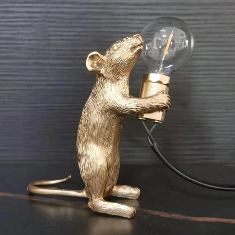 Kid Friendly Gold Finish Cute Mouse Desk Lamp With E12 LED Bulb Included, side view, detailed resin mouse holding bulb on dark background.