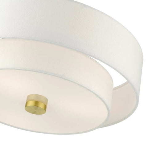 Close-up of Meridian Collection 3 Light Satin Brass Semi Flush Mount Ceiling Light with Off White Hardback Fabric Shade