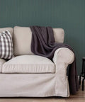 Living room with beige couch, plaid pillow, and Black Faux Beadboard Peel And Stick Wallpaper Removable And Repositionable Self Adhesive No Mess