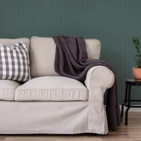 Living room with beige couch, plaid pillow, and Black Faux Beadboard Peel And Stick Wallpaper Removable And Repositionable Self Adhesive No Mess