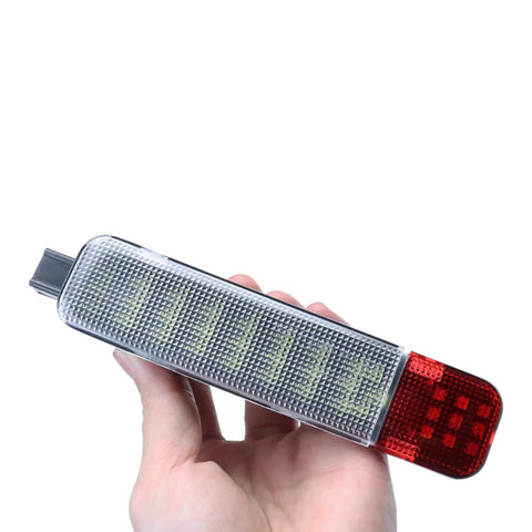 Hand holding LED Door Courtesy Lights Kit For Chevy Silverado GMC Sierra Suburban Avalanche Hummer H2 Yukon Interior Door Panel