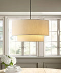 Two Tier Drum Pendant Light With Adjustable Hanging Wire Hassle Free Install And Streamlined Design Nails That Timeless Farmhouse Vibe Flawlessly For Your Kitchen Island Or Family Room Setup Accommodates Three Standard E26 Bulbs, off white linen shade above dining table.