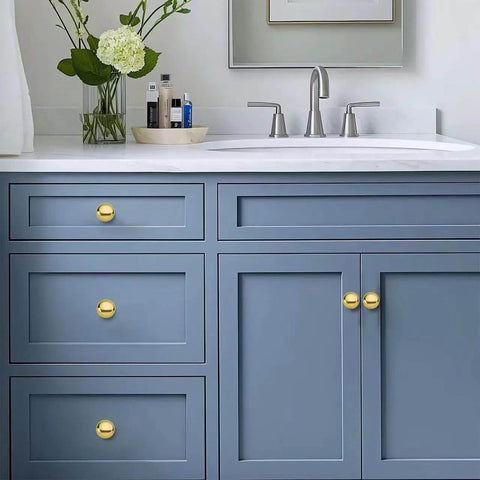 Blue cabinets with Unlacquered Brass Cabinet Knobs One And A Quarter Inch Round Pulls Vintage Retro Classic Style 2 Pack shown.