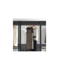 Heavy Duty Wood Walk In Closet Organizer System With Customizable Shelving And Rustic Gray Finish with hanging dresses and blouses.