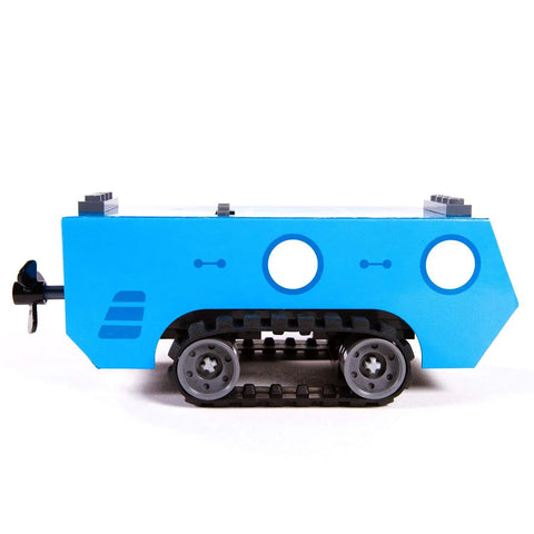 Blue vehicle model from Gears Go Multi Vehicle Mobility Launch Kit For STEM Lovers with treaded wheels and brick overlays.