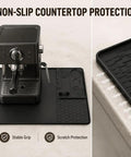 Straight Fire Premium Silicone Coffee Drip Mat With Built In Tamping Station, Non Slip Overflow Shield For Oster Perfect Brew, Heavy Duty Barista Counter Organizer And Quick Drainage Tray, Black used under espresso machine.