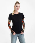 Snag These Fly Ice Silk Arm Sleeves With Cute Cat Graphics And Grippy Thumb Holes Offering Ultra Cool UV Shielding For Hot Days Of Running Cycling Or Driving on a woman against a white background.