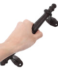 Hand holding Vintage Cast Iron Door Pull Handle for Garden Gates and Patio Hardware Set With Mounting Hardware Heavy Duty