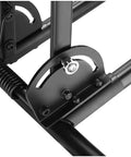 Close-up of a Foldable Bike Rack Floor Stand For Easy No Hassle Bike Storage Fits 20mm To Two Point Four Inch Wide Tires on metal frame
