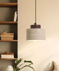 Modern Mini Pendant Light, Travertine Stone Light Fixture with Wooden Accent above a cozy shelf and couch setting.