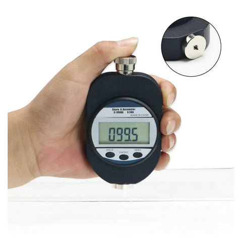 Portable Digital Shore A Durometer Hardness Tester Meter with Big LCD Screen held in hand displaying 99.5 hardness value.