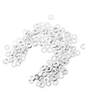 200 silver metal flat washers spread on a white background for rimless eyeglass frame repair and maintenance