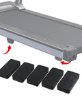 Heavy Duty Rubber Shock Absorbing Pads For Fitness Equipment Anti Slip Feet Bumpers 70x35mm shown near treadmill foot