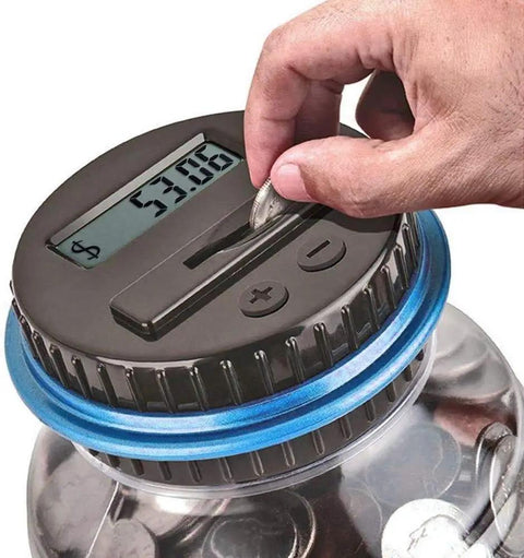 Coin Counter Money Jar With LCD Display Large 1.8L Digital Coin Bank counting coins with blue rimmed lid and hand inserting coin