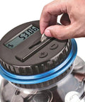 Digital Coin Bank With LCD Counter For Adults, 1.8L Large Capacity Money Jar, showing hand inserting coin into slot.