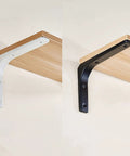 Built Like A Tank Heavy Duty Steel Shelf Brackets With Rock Solid Holding Power For Your Floating Shelves And Wall Corner Displays, No Sweat Setup, Dope White Finish, 75Mm Size, 2 Pack Kit in white and black finish.