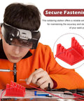 Person using Magnetic Helping Hands Soldering Station With Five Slot Wire Holder Clamp for precise soldering work.