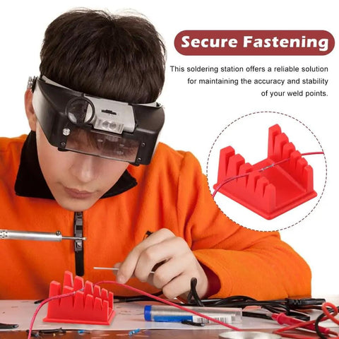 Person using Magnetic Helping Hands Soldering Station With Five Slot Wire Holder Clamp for precise soldering work.