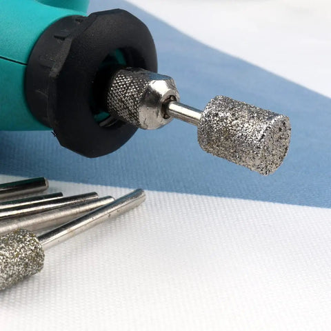 Pro Grade Diamond Grinding Burr Drill Bit Set One Eighth Inch Shank on rotary tool with cylindrical head for stone carving