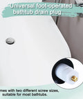 Plug And Play Toe Touch Bathtub Drain Stopper In Smooth Brushed Nickel For Quick Tub Swaps With Exact Fit Thread Studs and secure locking washers installed in a white bathtub.