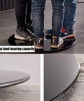 Heavy Duty Black Tempered Glass Lazy Susan Serving Turntable Featuring Smooth As Butter Spin For Effortless Food Sharing And Serious Kitchen Game Changer Vibes In A Generous 31 Inch Format with three people standing on it.