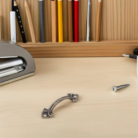 Retro Drawer Knobs Vintage Jewelry Box Pulls Metal Cabinet Handles on wooden desk with tools for install