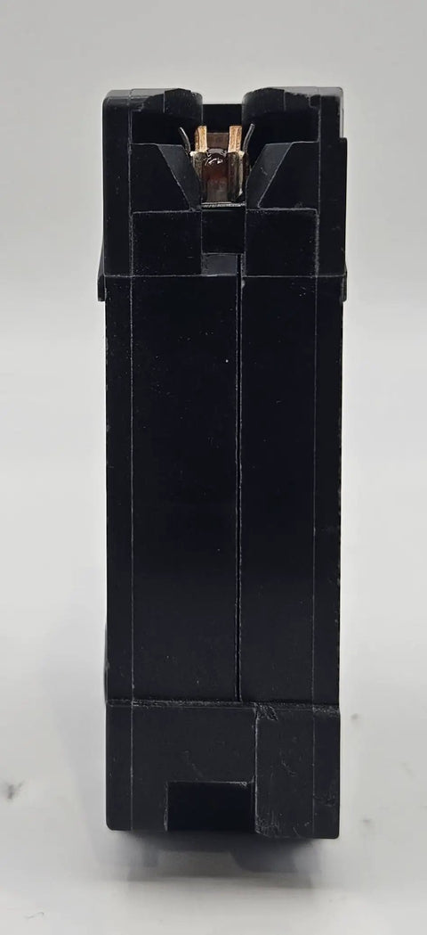 Side view of a black Homeline 20 Amp 120 Volt Plug In Circuit Breaker 1 Pole UL Listed 10 kA AIR Standard Type 10 Pack for panel install.