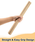 Person holding a bundle of Top Shelf Unfinished Round Wooden Dowel Rods 1/4 X 18 Inch Birch Craft Sticks for DIY projects.