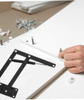 HOLIDYOYO heavy-duty lift-up spring hinge, black metal, installation view on white cabinet panel.