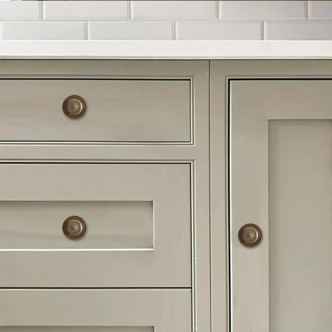 Heavy Duty Antique Brass Cabinet Knobs With Vintage Backplate Two Pack on kitchen drawers, showcasing 35 mm round design.