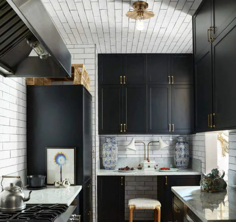 Vintage Metal Ceiling Light Fixture With Brass Finish, Split Flower Design, installed in modern kitchen with white tiles.