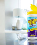 Invisible Glass Wipes bottle with yellow cap; pre-moistened, streak-free glass wipes for windows and mirrors.