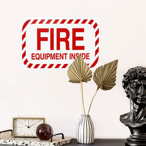 Fire Safety Warning Sign 8 By 12 Inch Aluminum Rustproof Metal Plate for Indoor Outdoor Use displayed on a wall with decor.